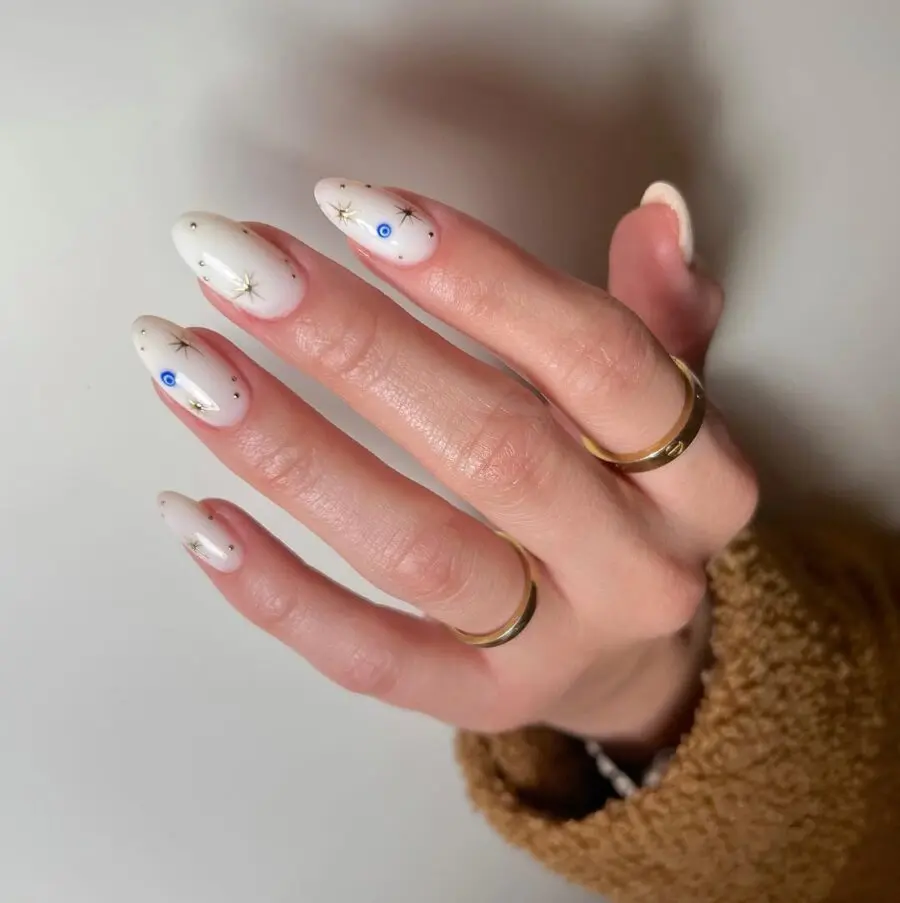 Chic milky nails with elegant star designs