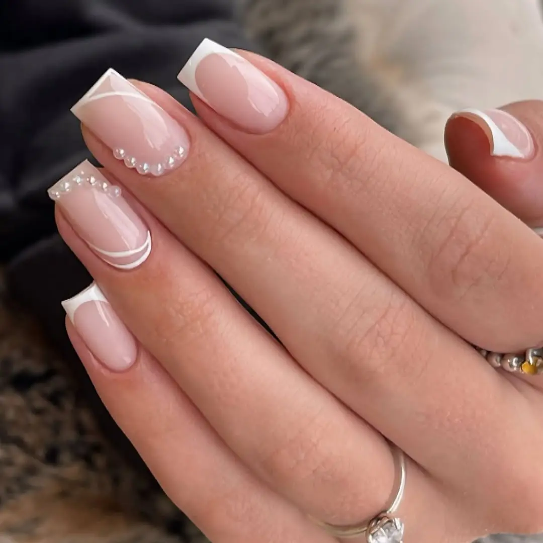Elegant French Tip Nails with Delicate Beads