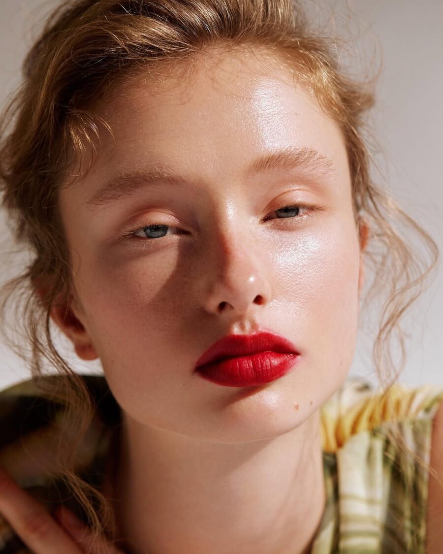Bold red lips with natural skin glow