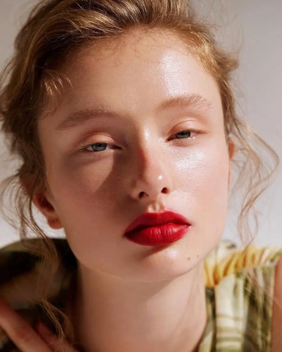 Bold red lips with natural skin glow