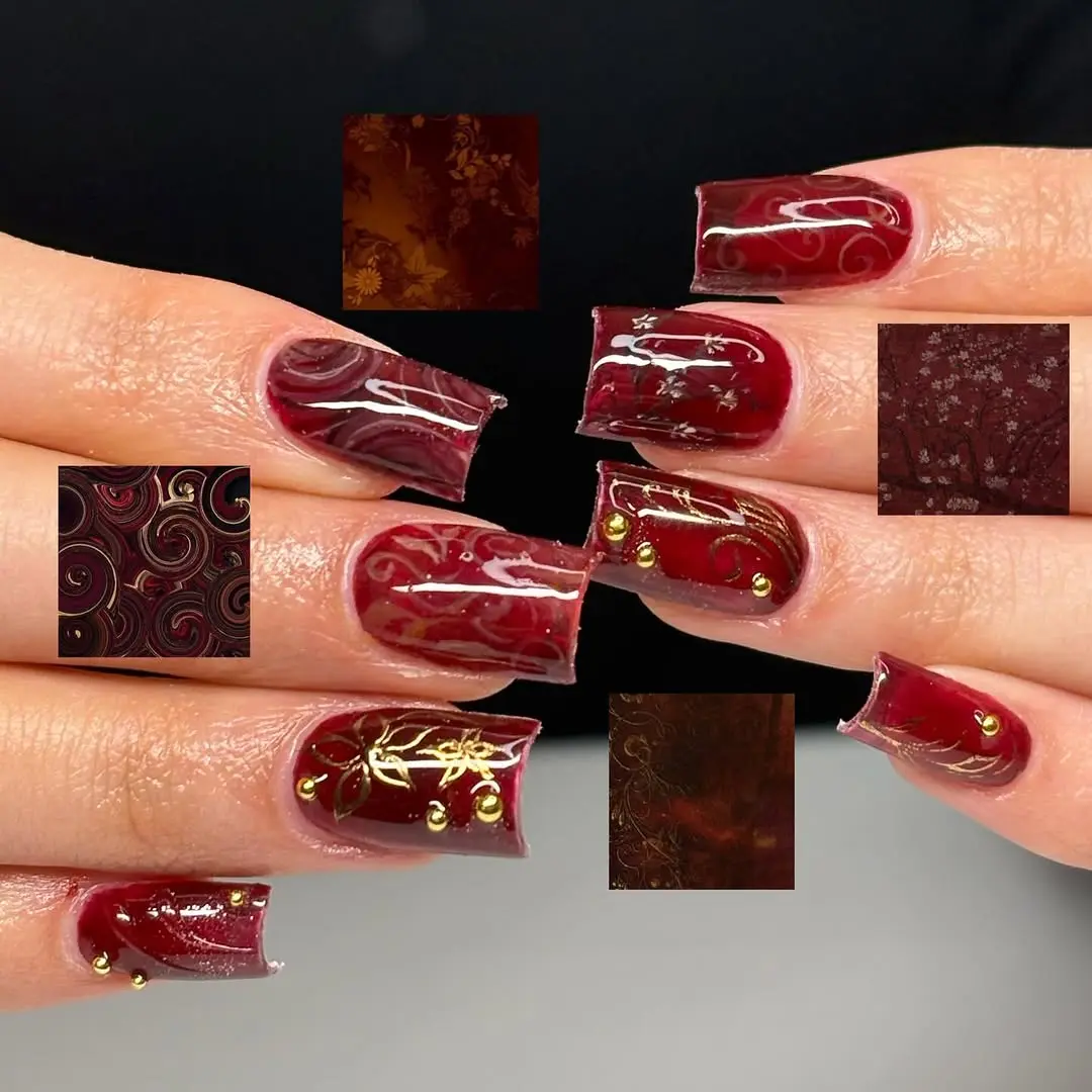 Stunning Red Glam Nails with Gold Accents
