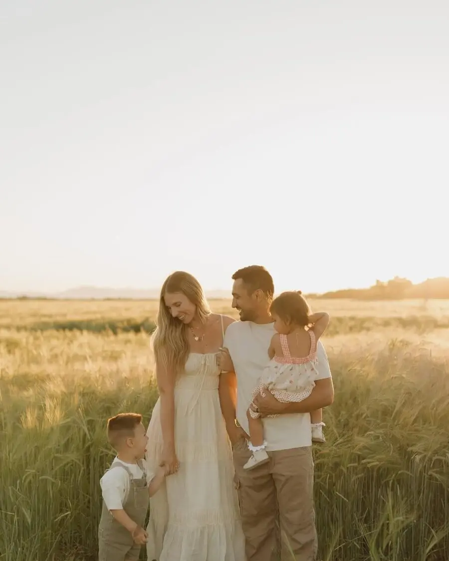 Charming family outfits against a golden sunset