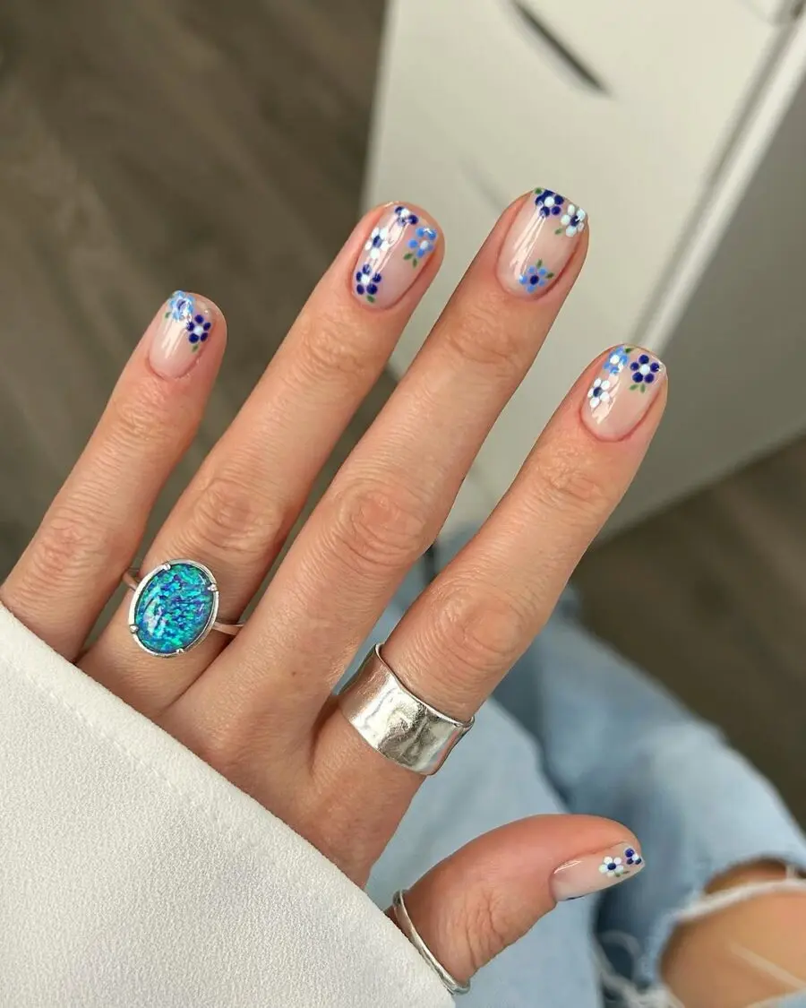 Charming blue floral nail art design