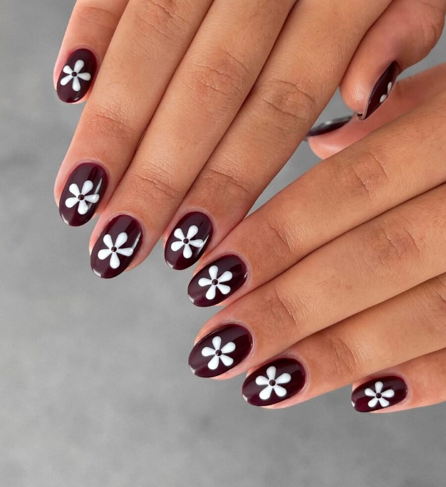 Chic Burgundy Nails with Delicate White Flowers