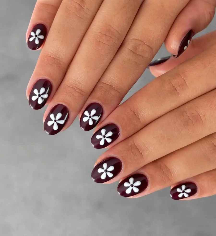 Chic Burgundy Nails with Delicate White Flowers