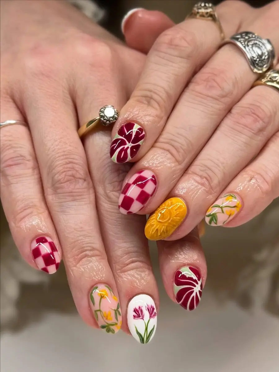 Colorful floral nail art with playful patterns