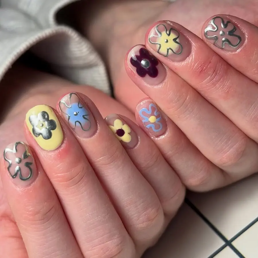 Vibrant flower nails with playful designs