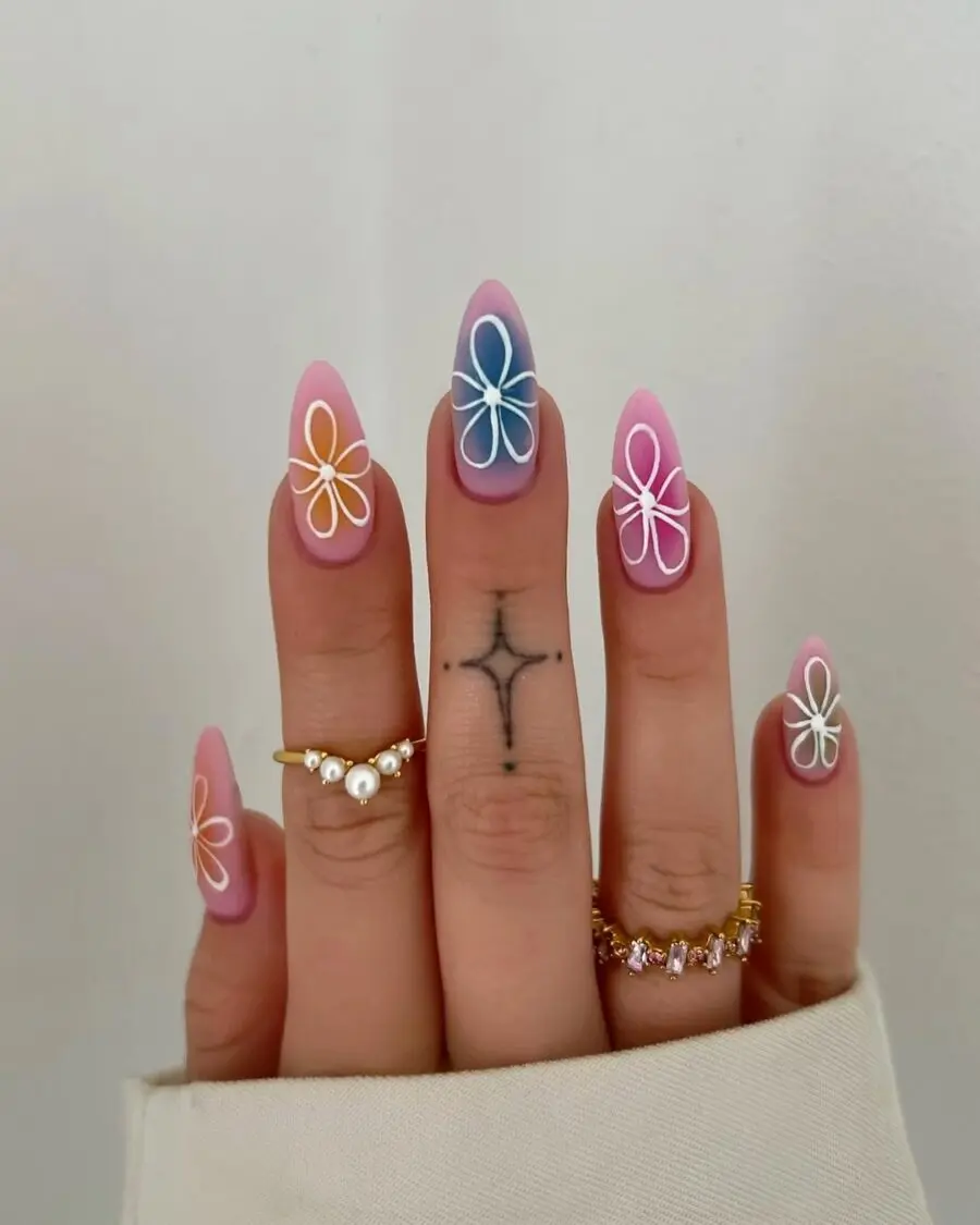 Whimsical flower nails with soft gradient colors