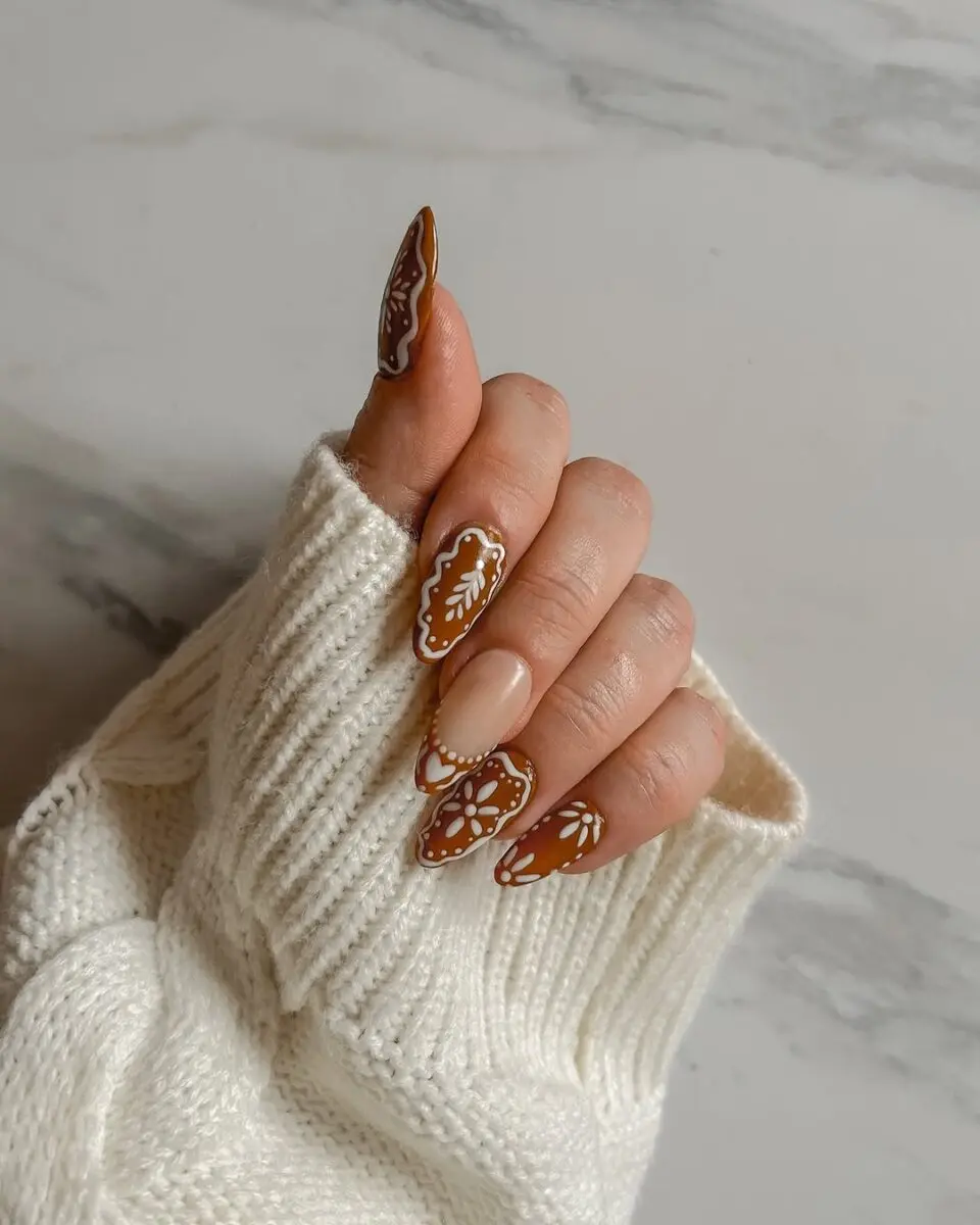 Stylish gingerbread-inspired nail art design