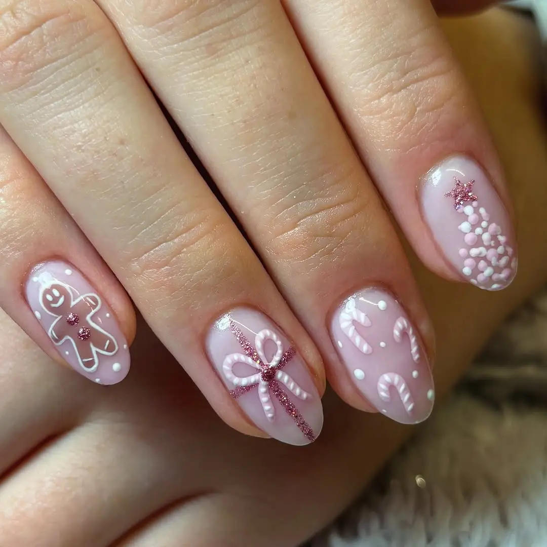 Festive pink gingerbread-inspired nail art design