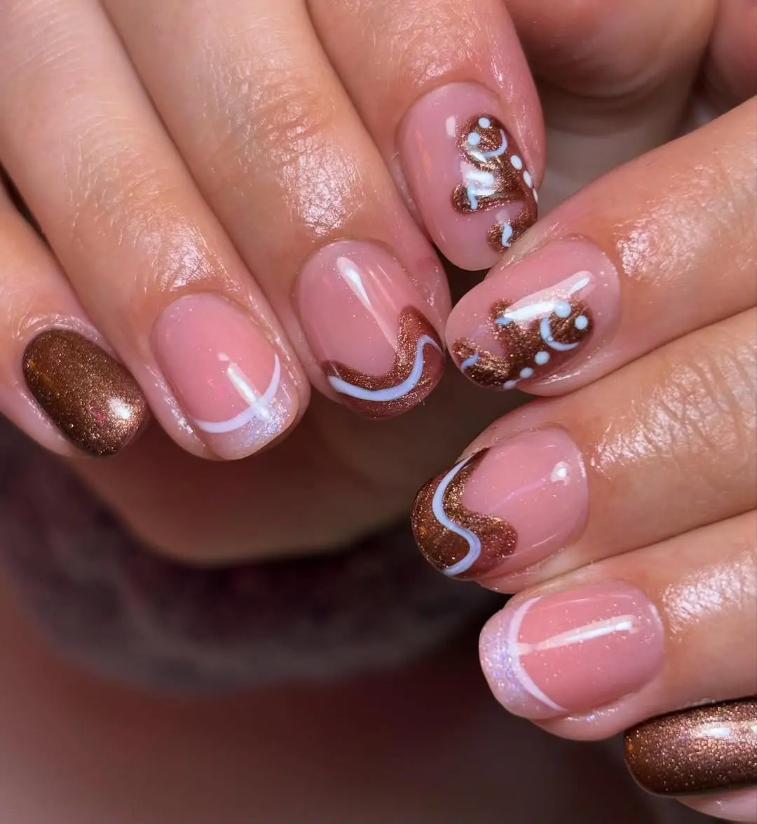 Charming gingerbread-inspired nail art design