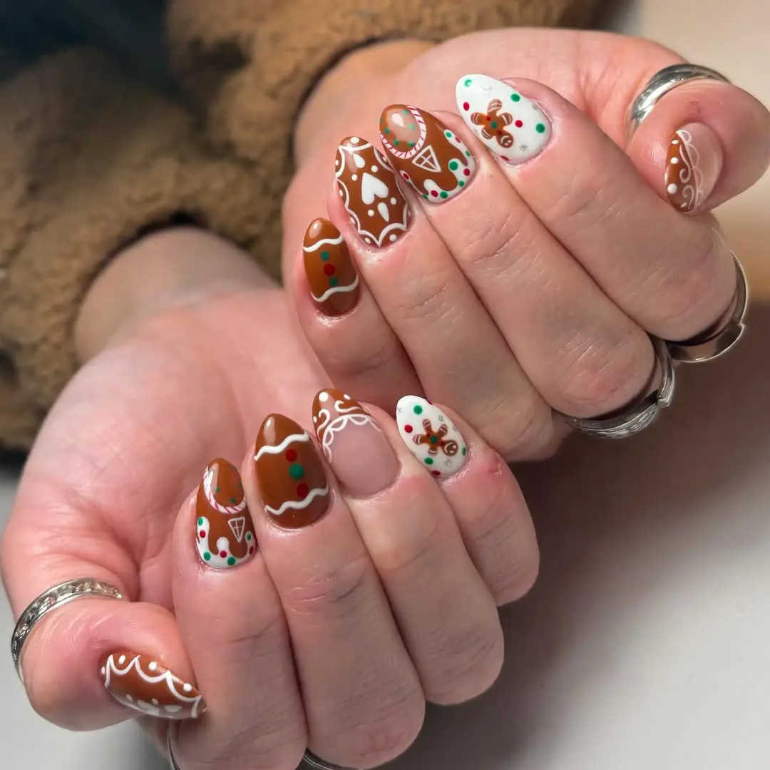 Delightfully festive gingerbread nail art design
