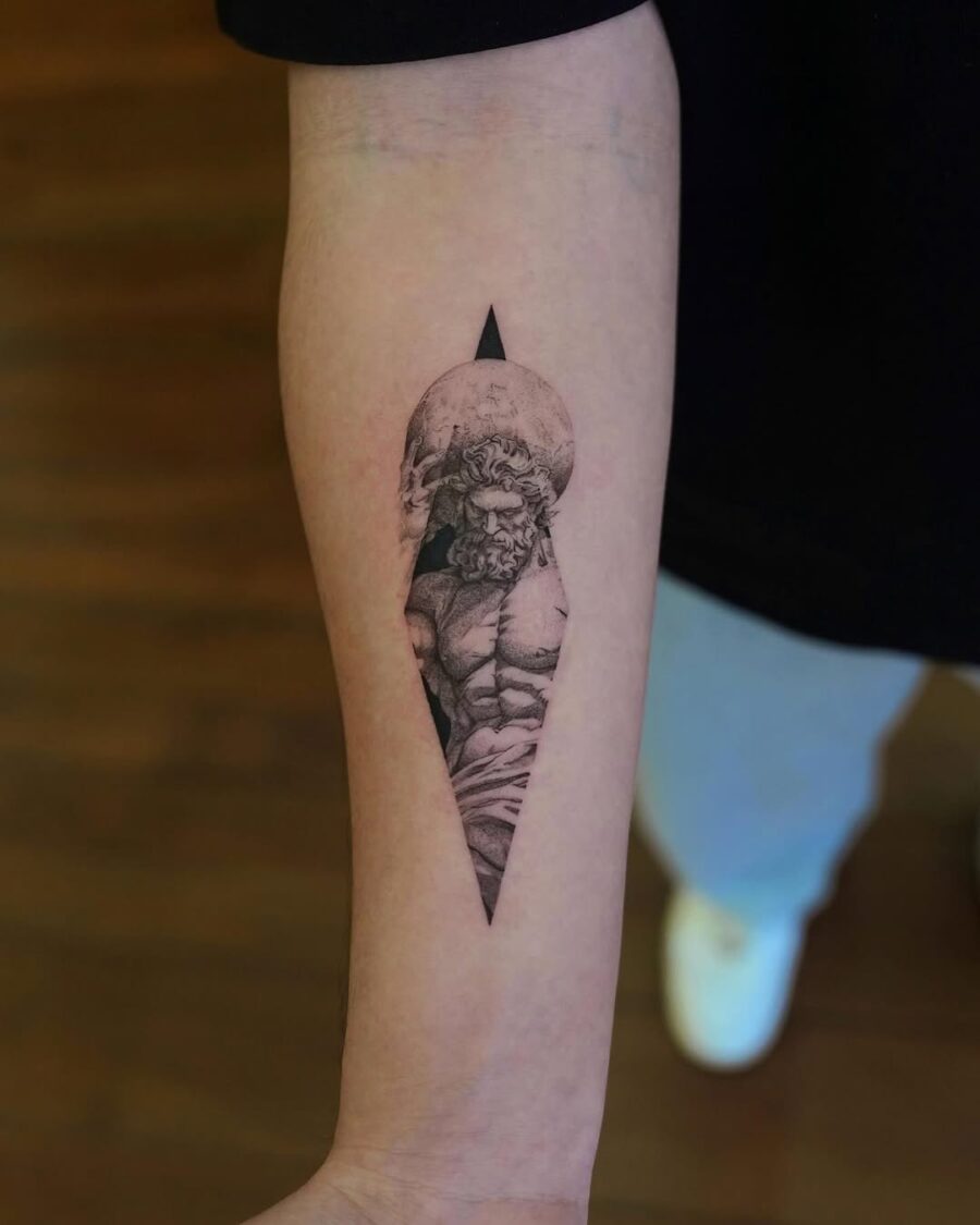 A striking Zeus tattoo with geometric flair