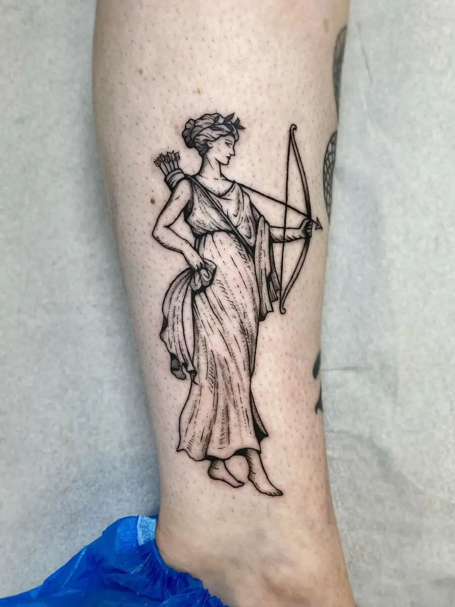 Elegant tattoo of a Greek goddess archer