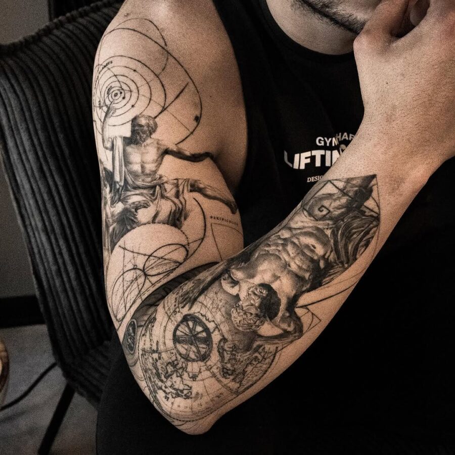 Intricate Greek gods tattoos on a muscular arm