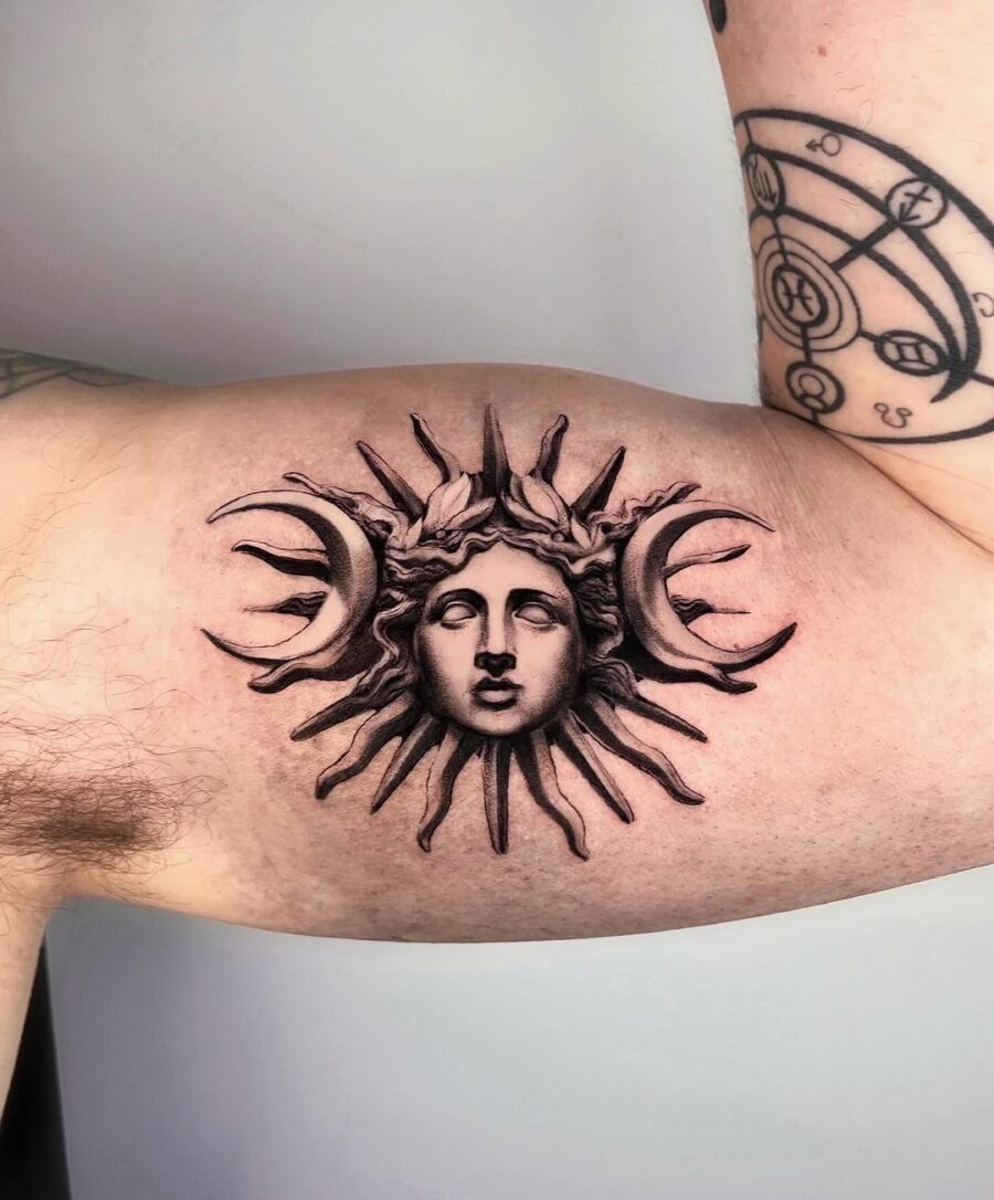 Intricate sun and moon goddess tattoo design