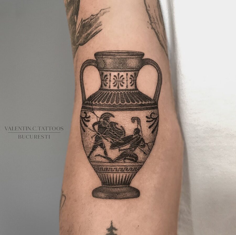 Intricate Greek vase tattoo depicting mythology.