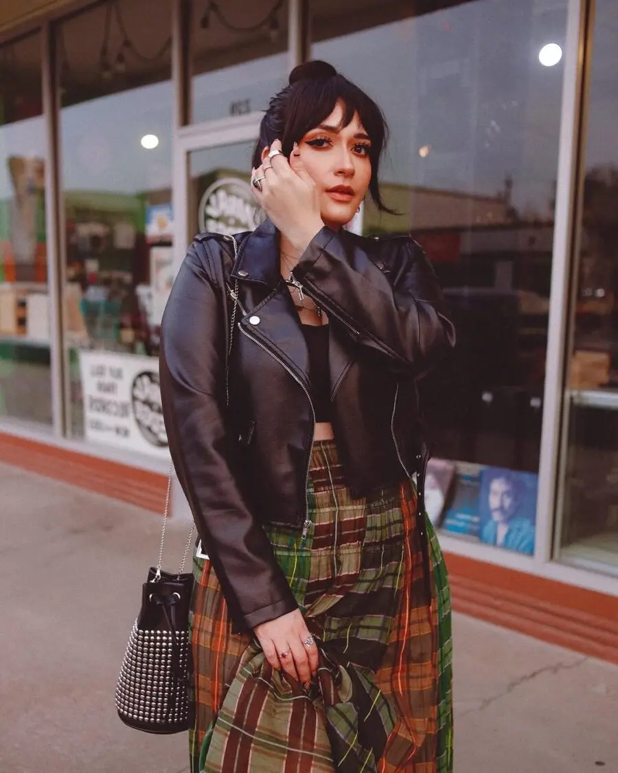 Edgy leather jacket meets chic plaid vibes