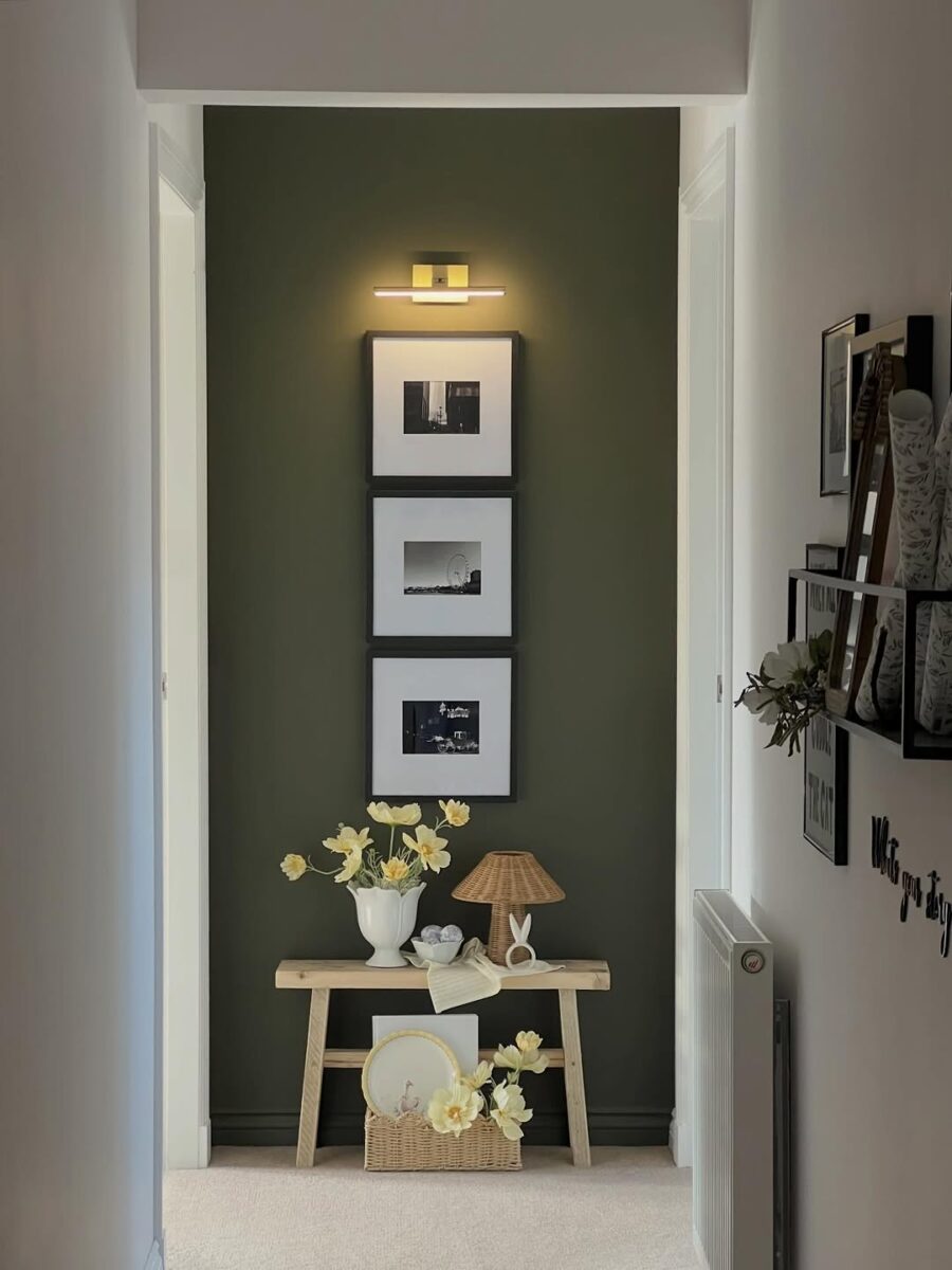 Chic hallway with art and warm lighting