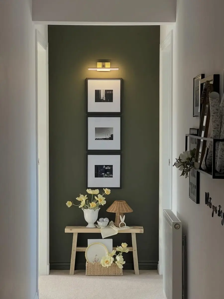Chic hallway with art and warm lighting
