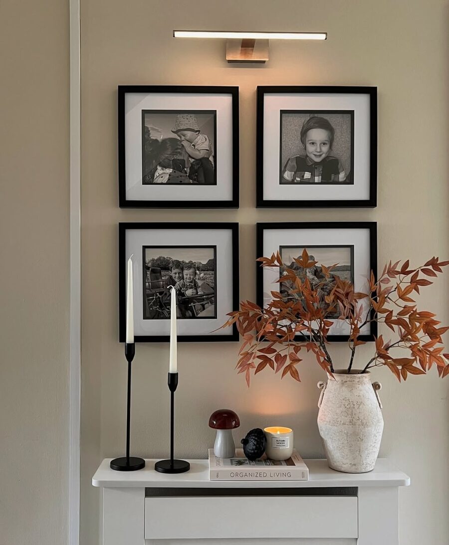Charming hallway with framed photographs and decor