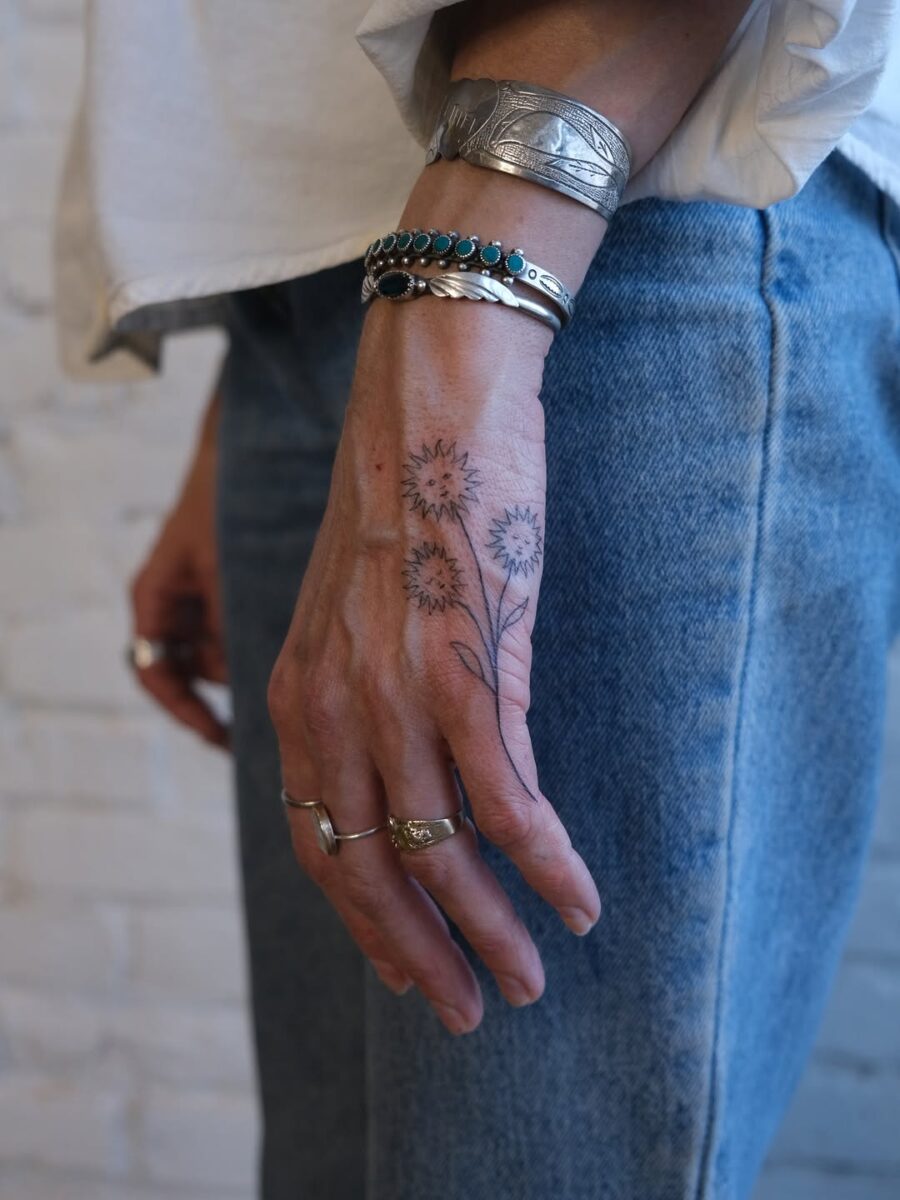 Chic floral design adorning the hand