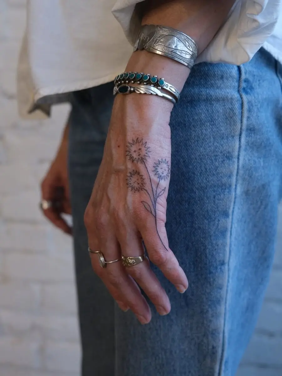 Chic floral design adorning the hand
