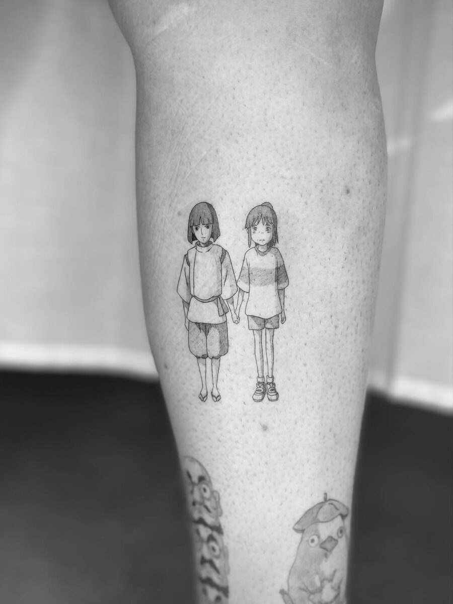 Adorable kids holding hands in adorable tattoo