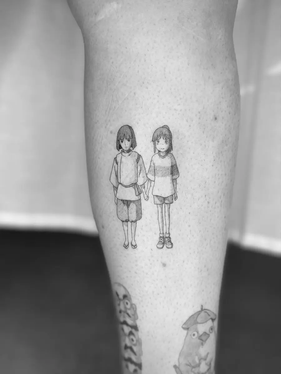 Adorable kids holding hands in adorable tattoo