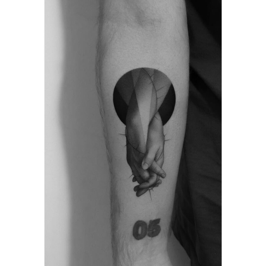 Elegant hands tattoo with geometric design