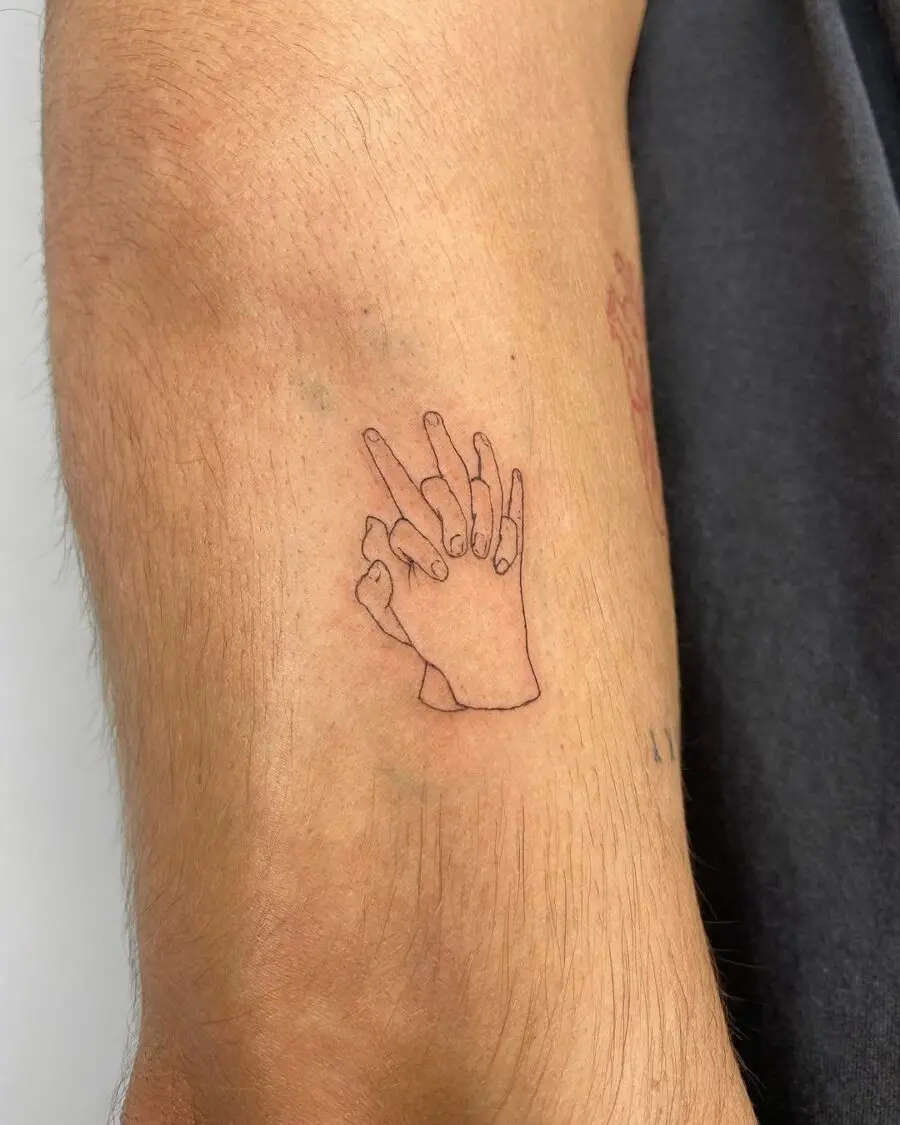 Minimalist Hands Tattoo with Bold Expression