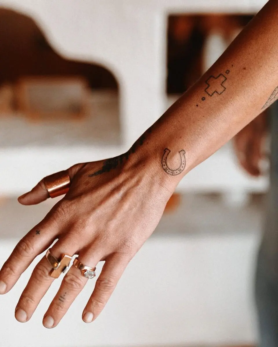 Charming horseshoe tattoo with unique detail