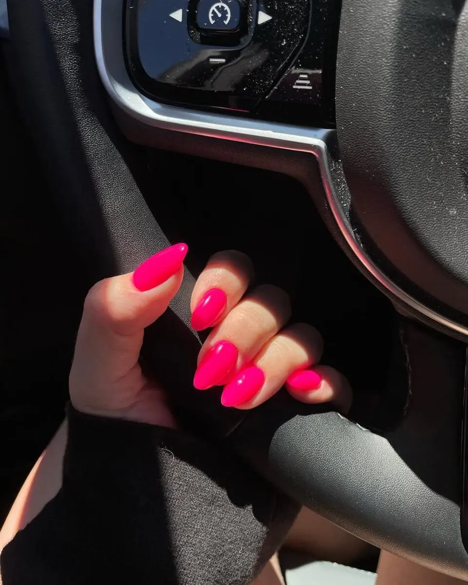 Vibrant hot pink nails for a stylish look