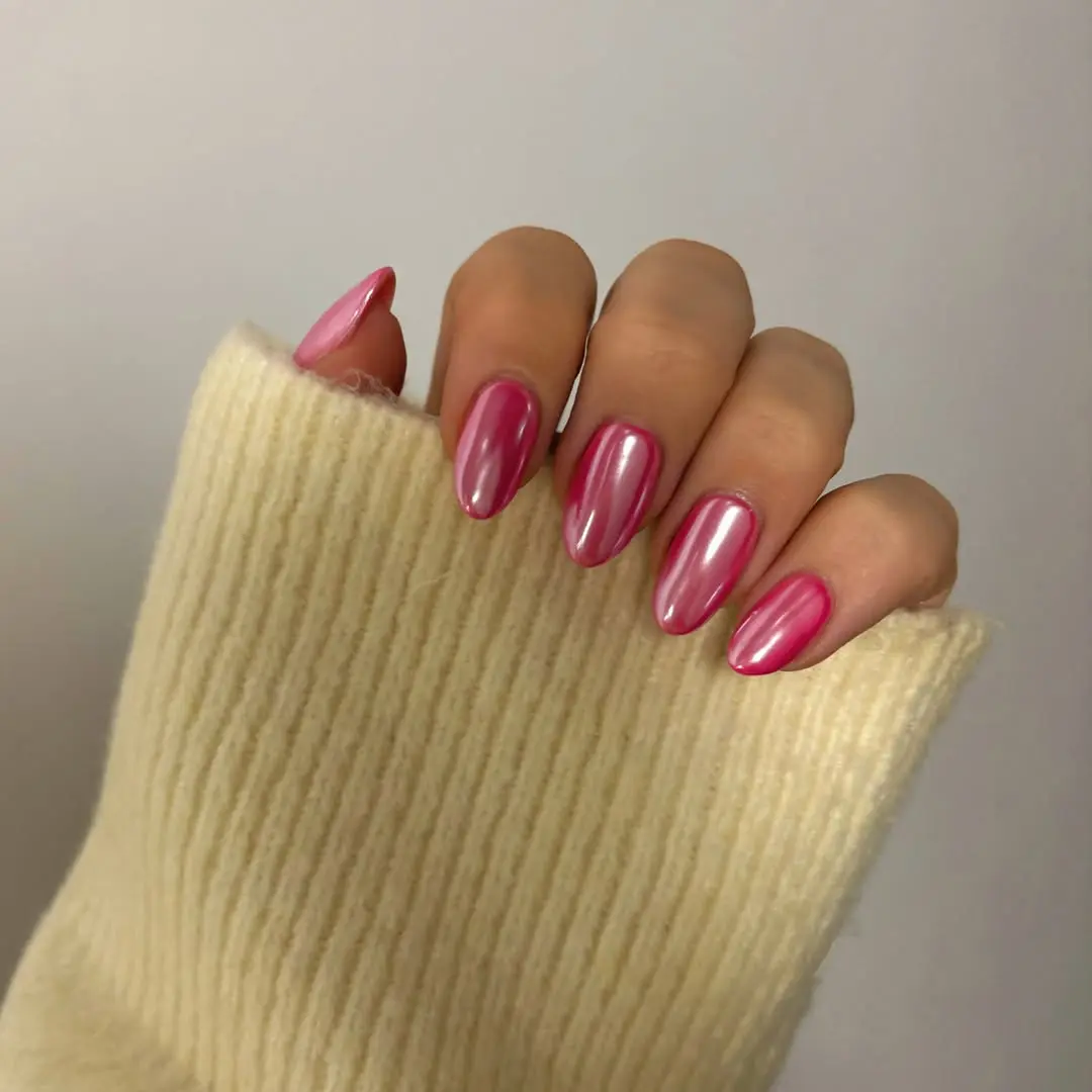 Stylish hot pink metallic nail look