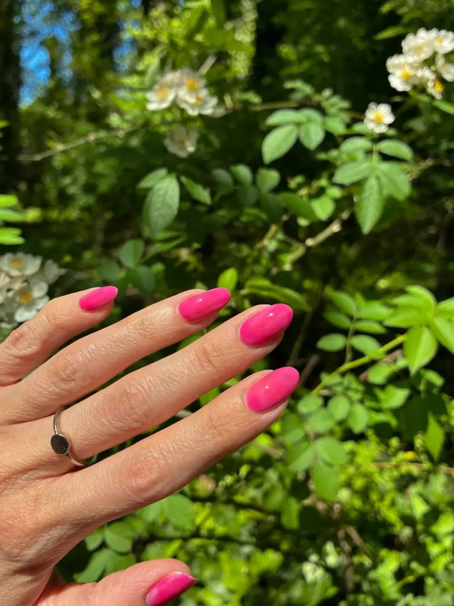 Vibrant hot pink nails perfect for spring