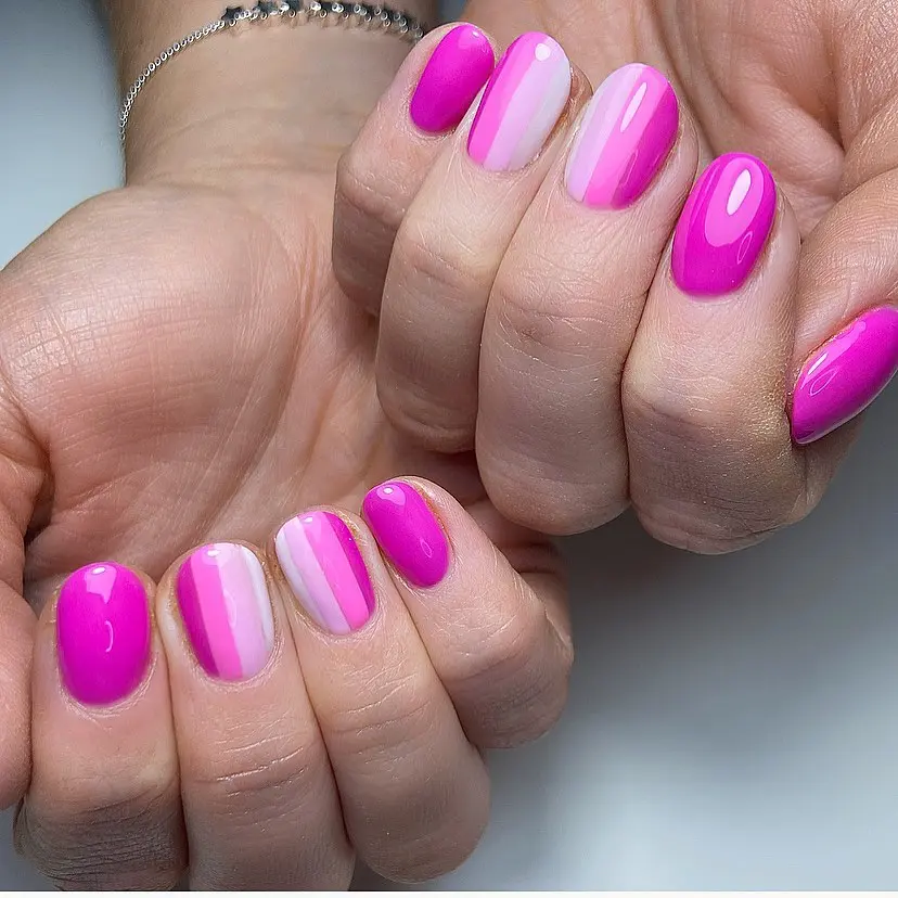 Vibrant Hot Pink Nails with Chic Stripes
