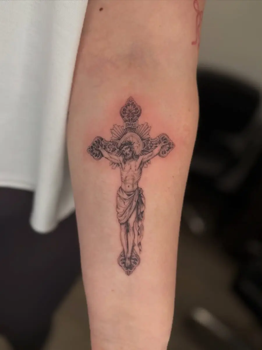 Intricate Jesus Cross Tattoo Capturing Faith