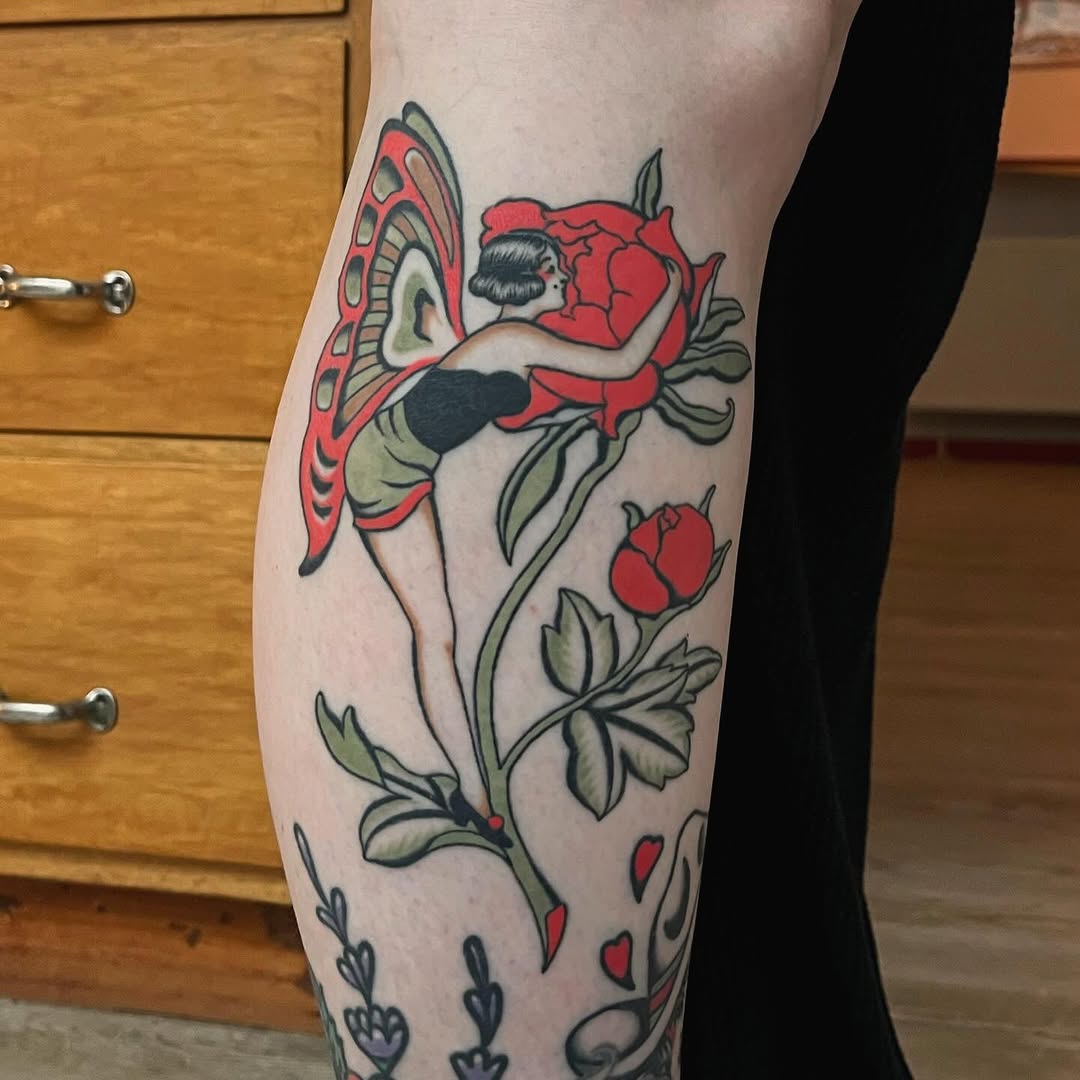 Whimsical butterfly and rose tattoo design