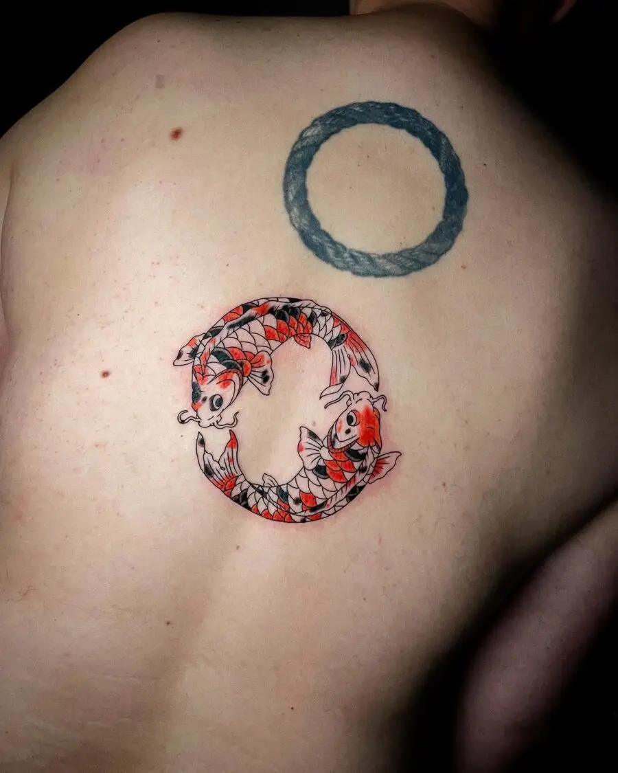 Symbolic koi fish tattoo represents harmony and balance