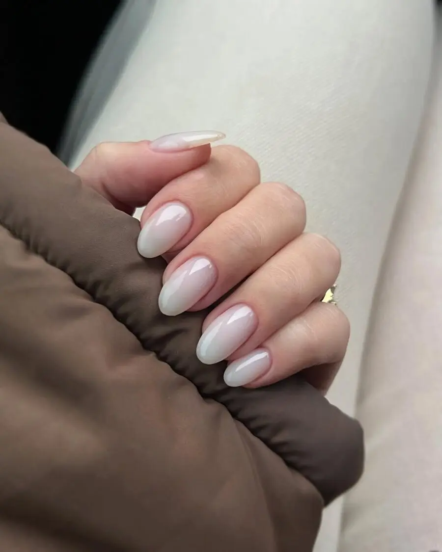 Elegant milky nails with a subtle ombre effect
