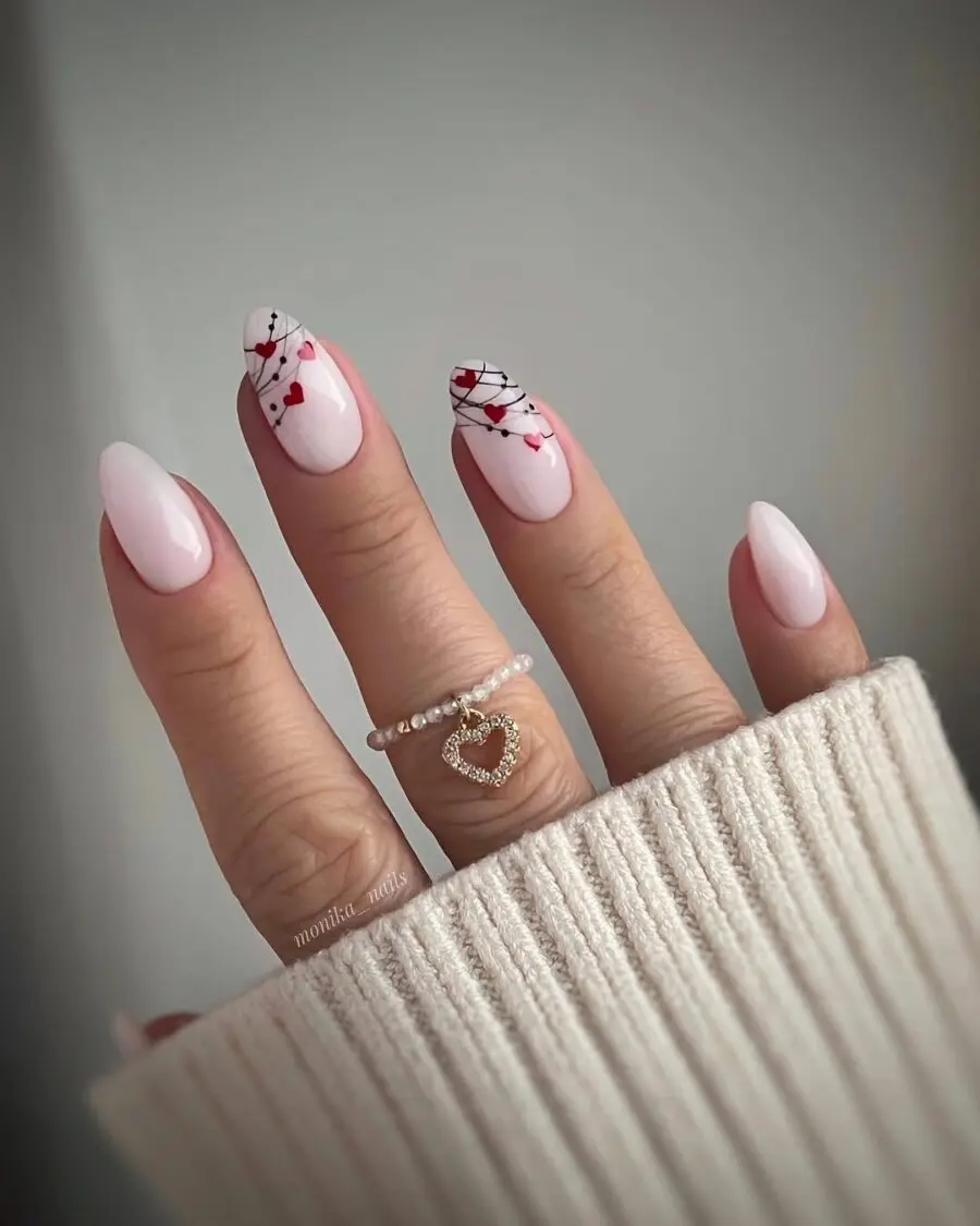 Chic milky nails with floral accents