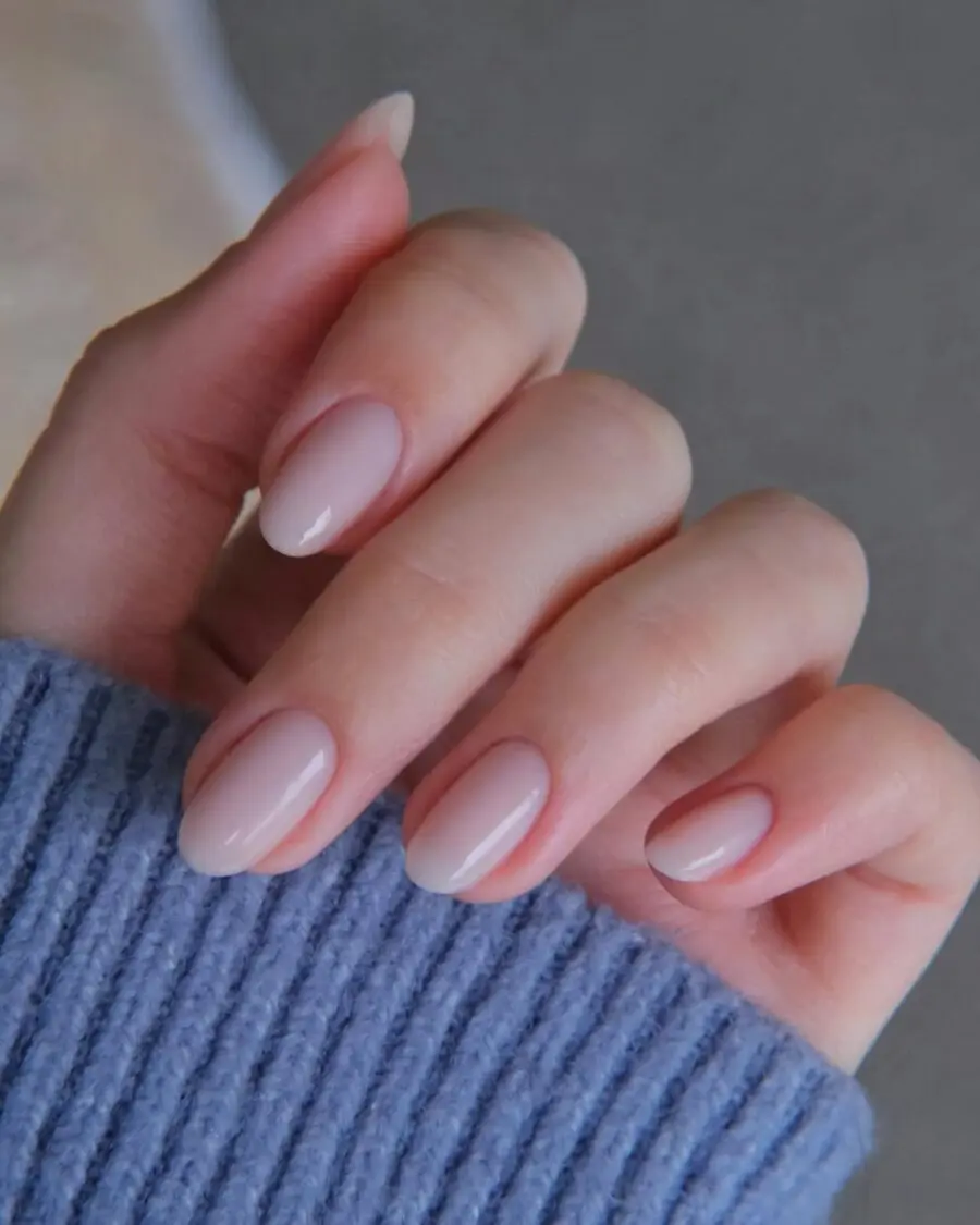 Elegant milky nails with subtle color gradients
