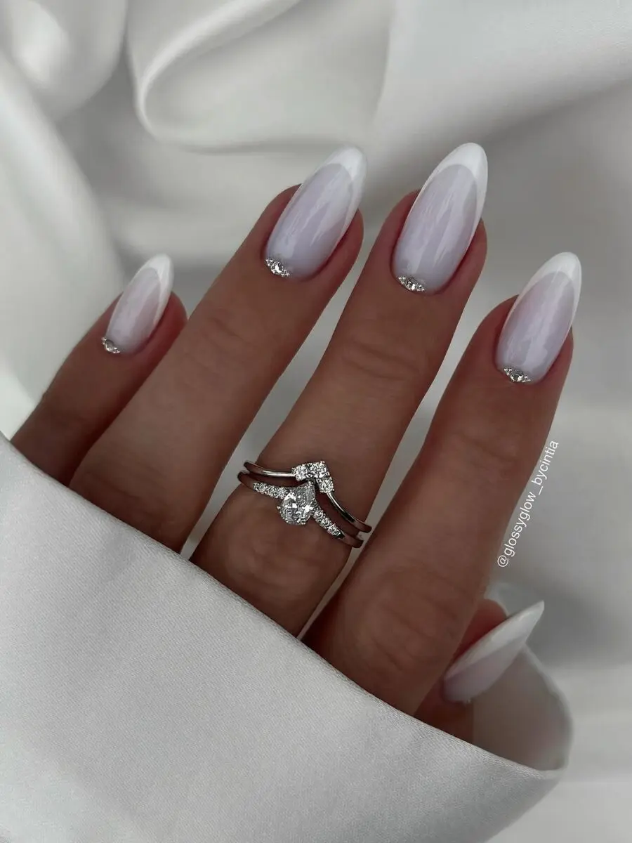 Chic Milky Nails with Dazzling Accents