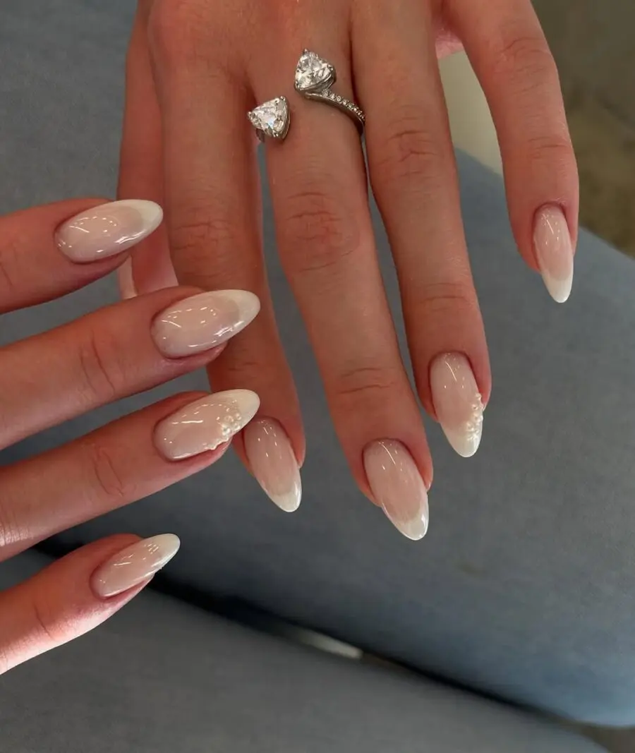 Chic milky nail art with elegant touch