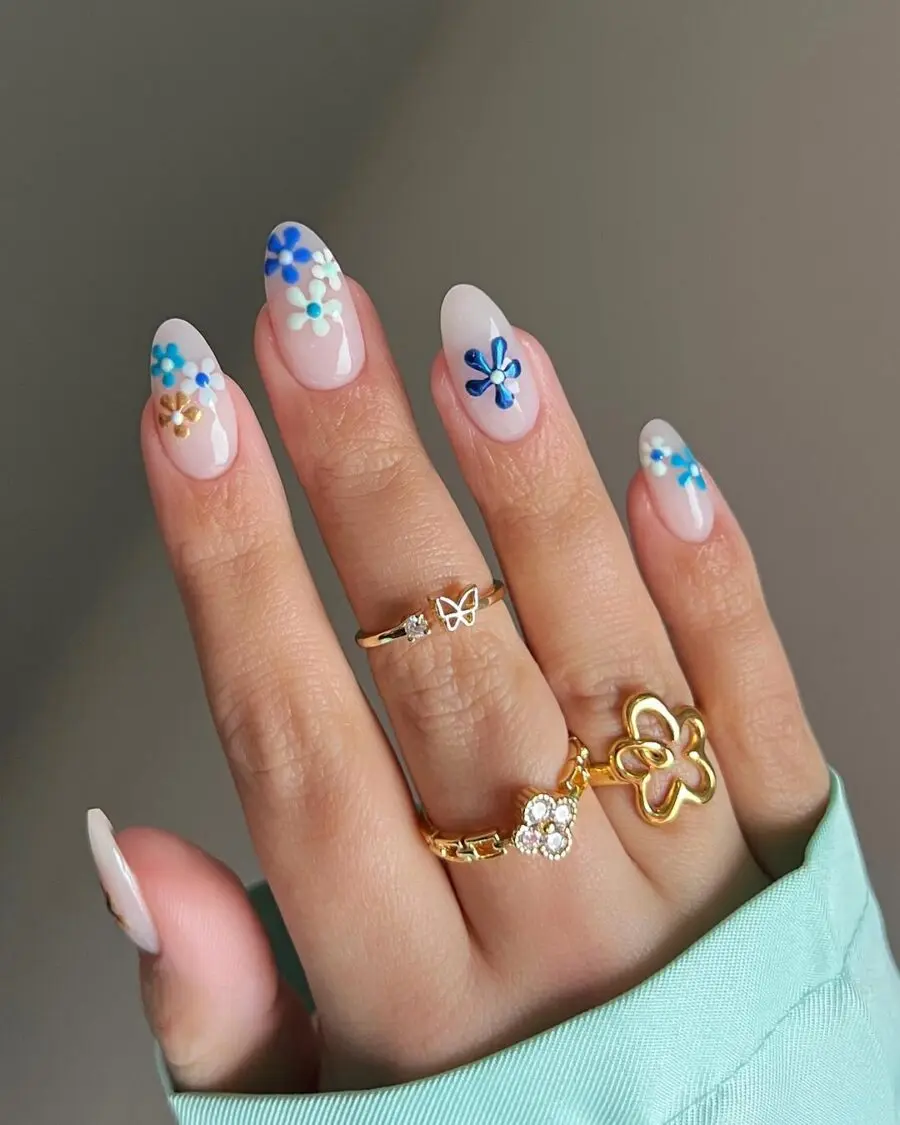 Charming milky nails adorned with floral accents