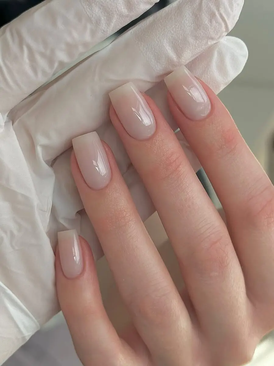 Elegant milky nails with a glossy finish