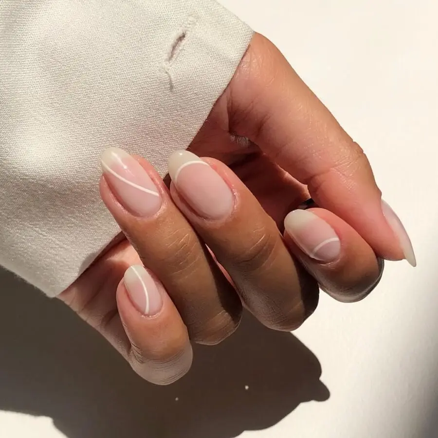 Sleek milky nails with a minimalist design