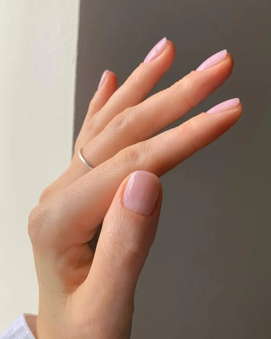 Soft pink milky nails radiate understated elegance.