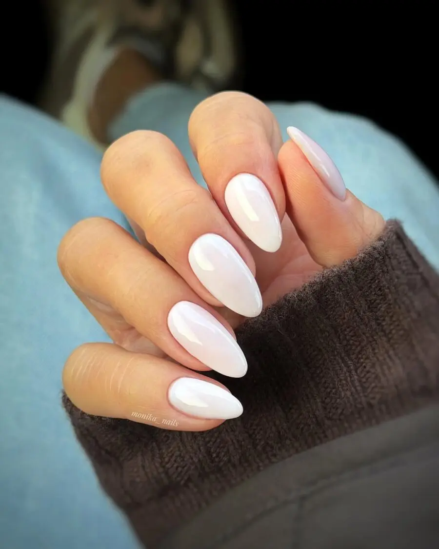 Elegant milky white oval-shaped nails