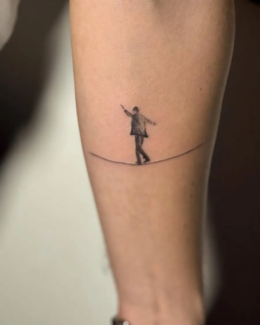 A minimalist tattoo symbolizing balance and mindfulness.